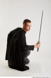 Claudio KNEELING POSE WITH SWORD